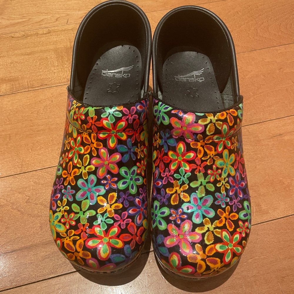 Dansko clogs with multi colored flowers size 40